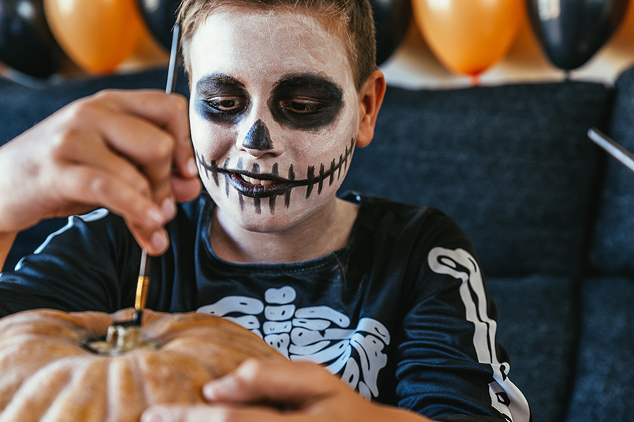 older boy in a halloween costume - tween wheelchair user