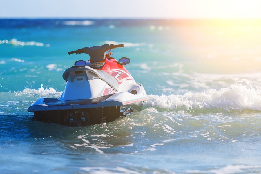 Jet Ski Moored inon on waves of sea