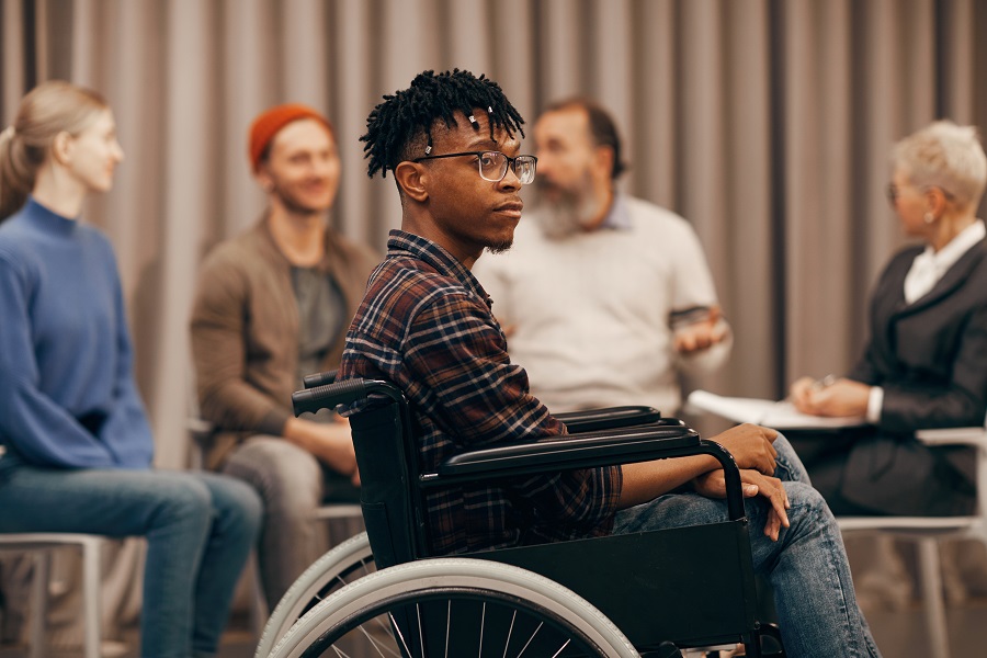 Young African man in wheelchair