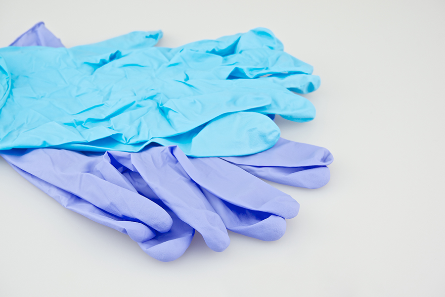 Blue and purple latex gloves