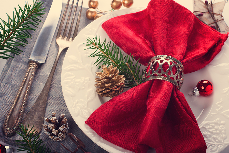 Christmas table place setting with decorations