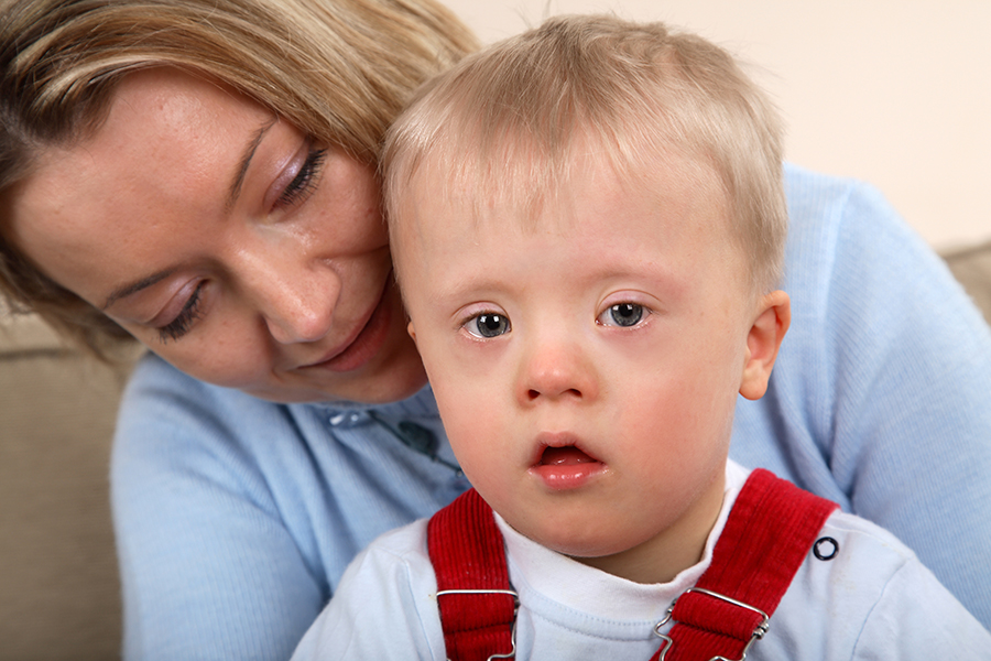 Down Syndrome boy and mother