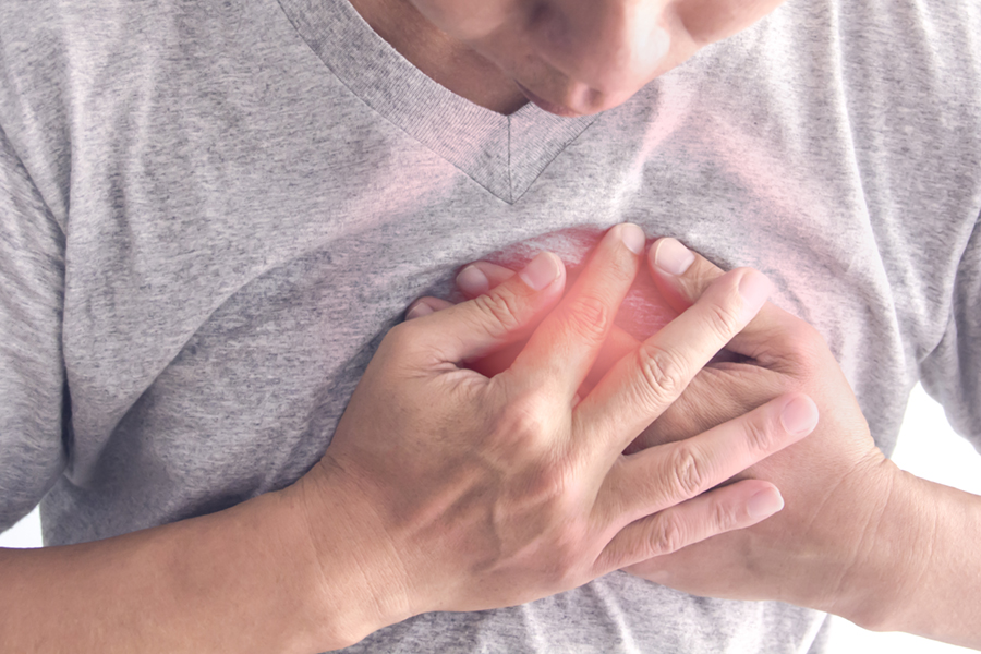 A Man having chest pain, heart disease.